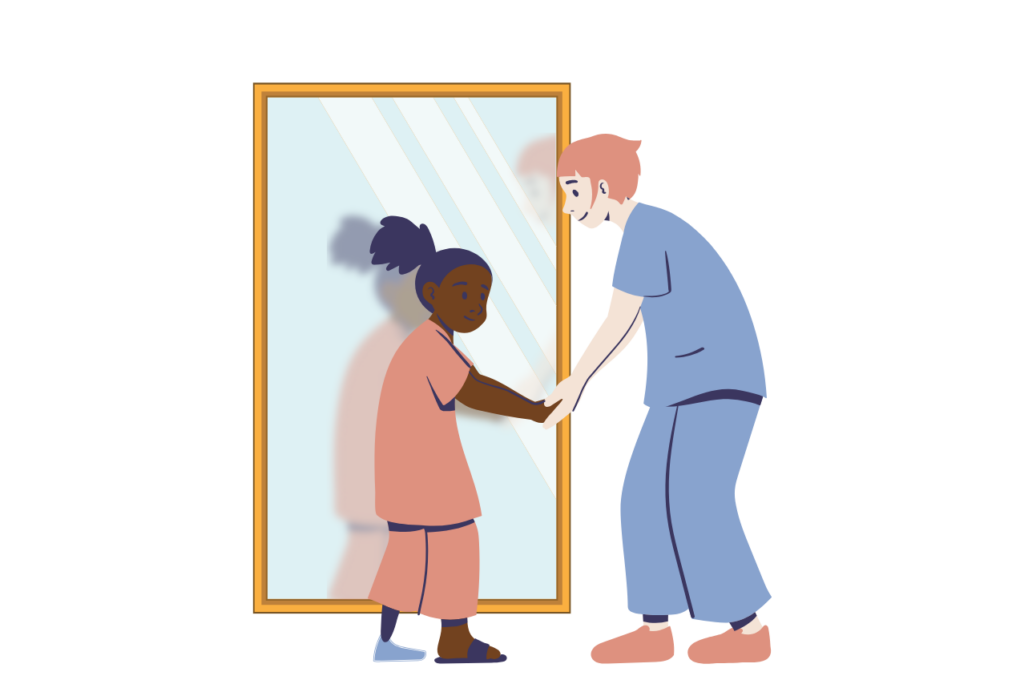 Photo of a physical therapist holding an eating disorder patient's hand in the mirror.